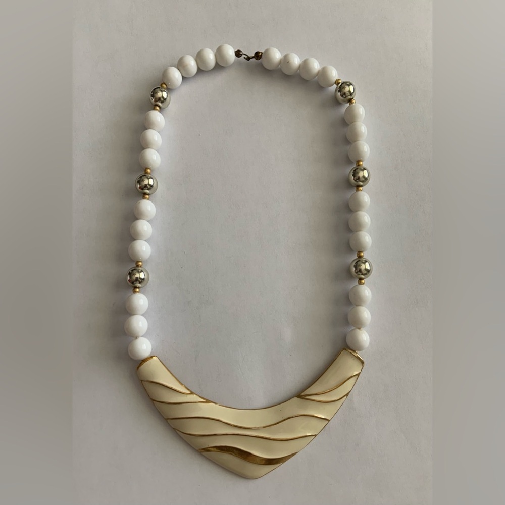 🦖5 for $20 | Vintage necklace with a white and gold enamel pendant